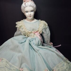 Elegant Porcelain Doll with Blue Dress